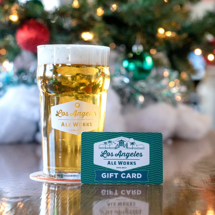 Glass of beer and gift card